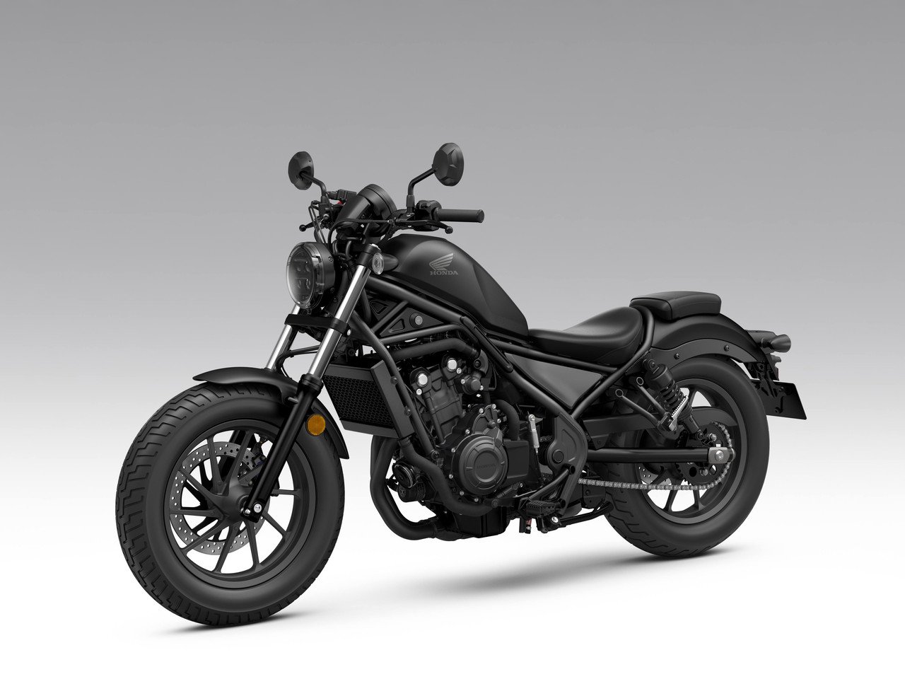 Honda Rebel 500 2027 preta fosca vista de frente, pelo lado esquerdo