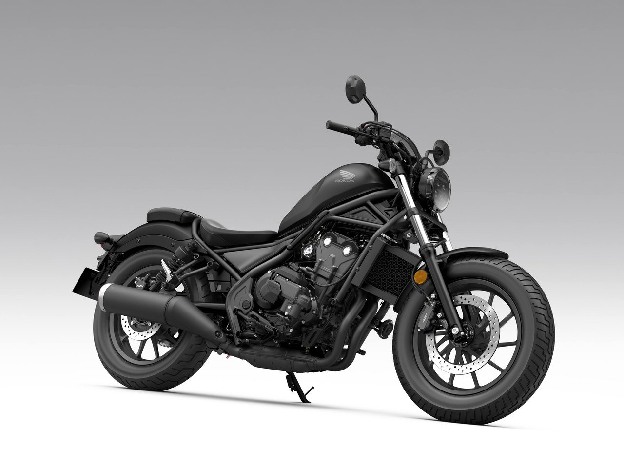 Honda Rebel 500 2027 preta fosca vista de frente, pelo lado direito
