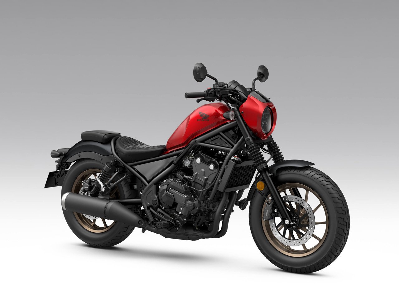 Honda Rebel 500 2027 S Edition vermelha com mini carenagem de farol e banco trapuntado